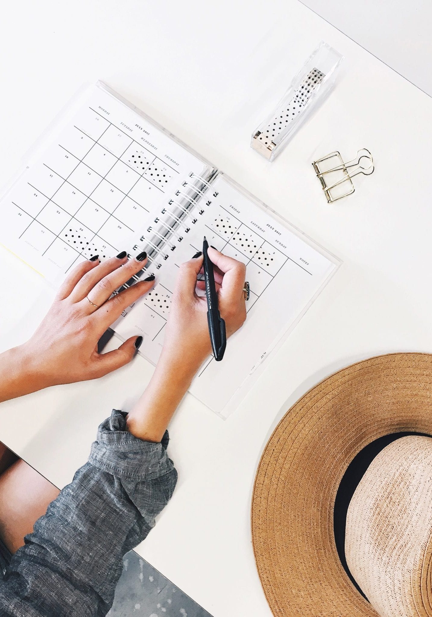 overhead view of girl writing in a journal